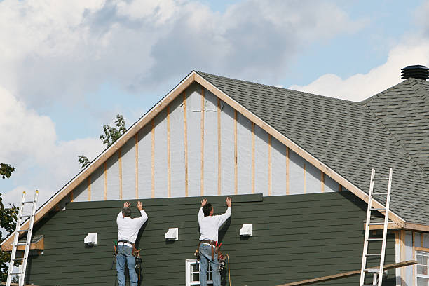 Professional Siding technician working in Guilford, IN